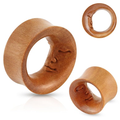 Tunnel aus Holz mit dem Mondgesicht
