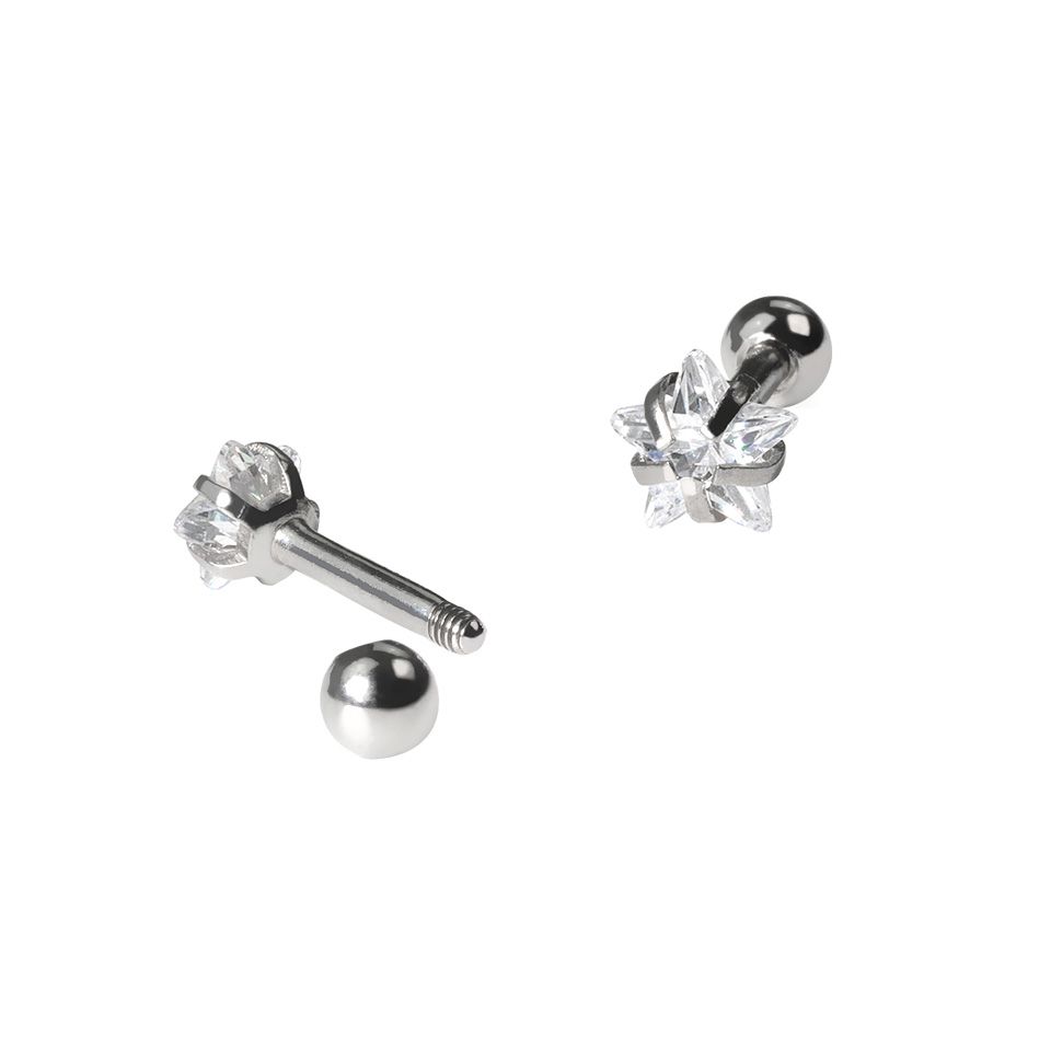 Set aus Ohrpiercings mit einem Sternenstein