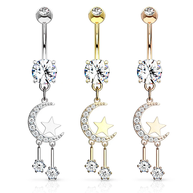 Bauchnabelpiercing mit Halbmond und Sternen als Anhänger