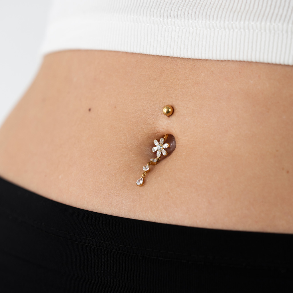 Bauchnabelring mit Blume und herabhängenden Schmucksteinen