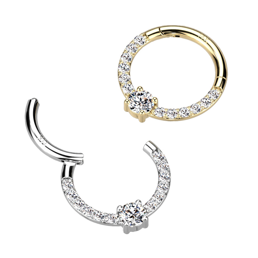 Scharnierring aus 14kt. Gold mit gefasster Vorderseite und rundem Mittelstein
